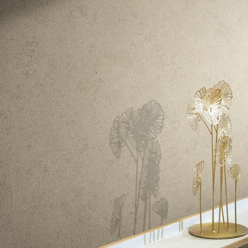 Carta da parati in tessuto non tessuto con moderna texture beige effetto gesso