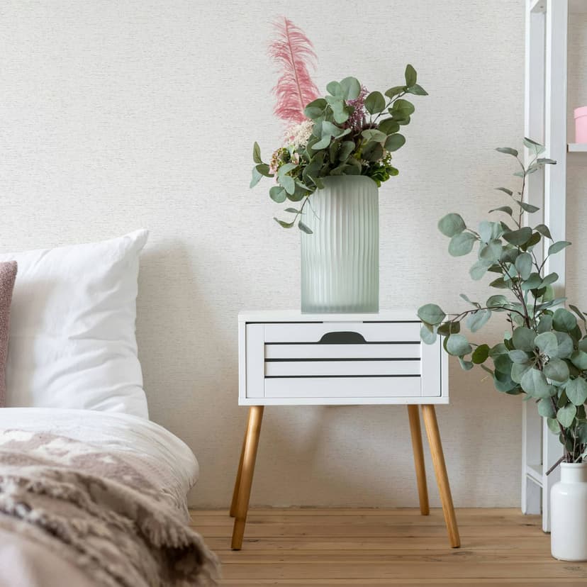 Carta da parati in tessuto non tessuto dall'aspetto leggermente screziato come tinta unita bianca