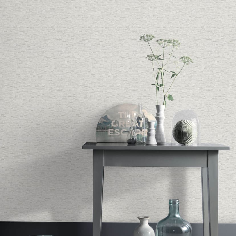Carta da parati in tessuto non tessuto di colore grigio con una trama fine, sottilmente moderna ed elegante senza tempo
