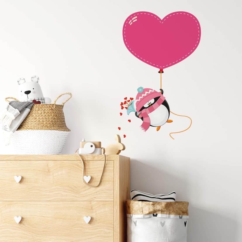 Adesivo murale - Pinguino con palloncino a forma di cuore